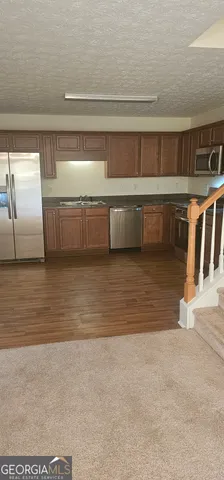 a view of a room with cabinets