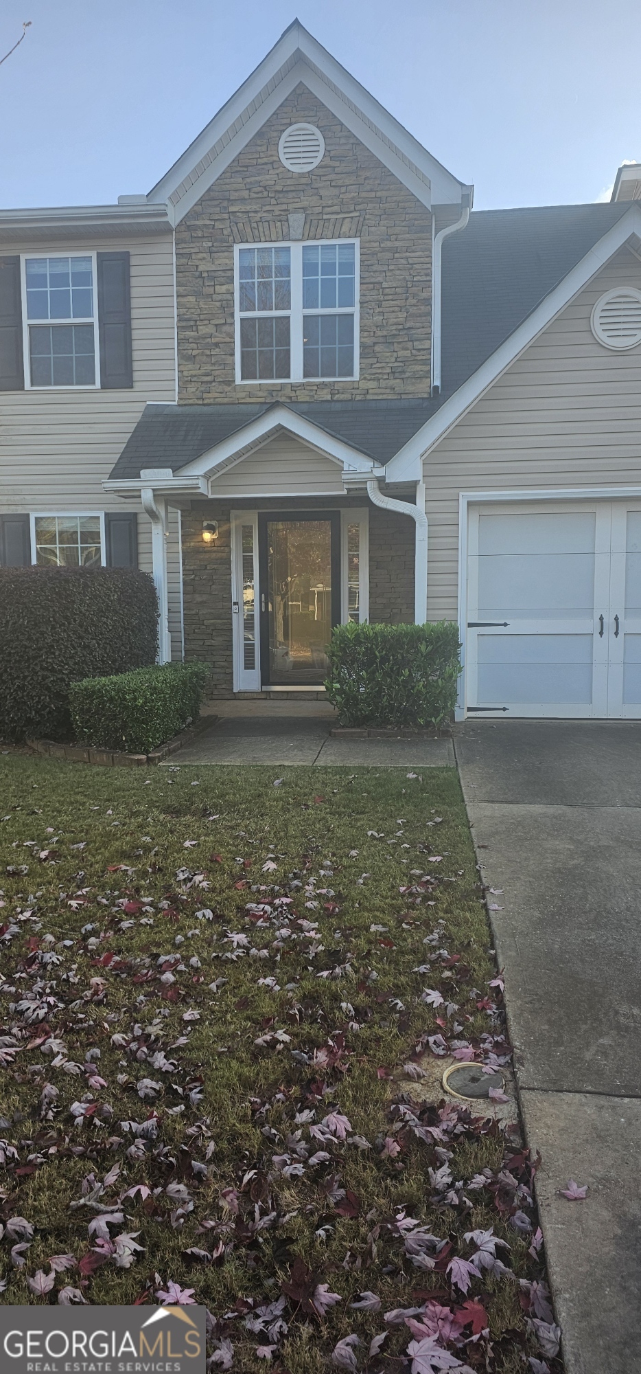 5000 Village Run Drive McDonough, GA 30252 - Photo 7 of 7 a front view of a house with garden