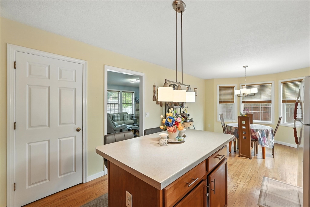 82 Lloyd Avenue Springfield, MA 01119 - Photo 14 of 32 a view of a dining room with furniture and wooden floor