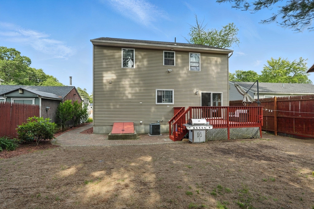 82 Lloyd Avenue Springfield, MA 01119 - Photo 30 of 32 a view of a house with a backyard and sitting area