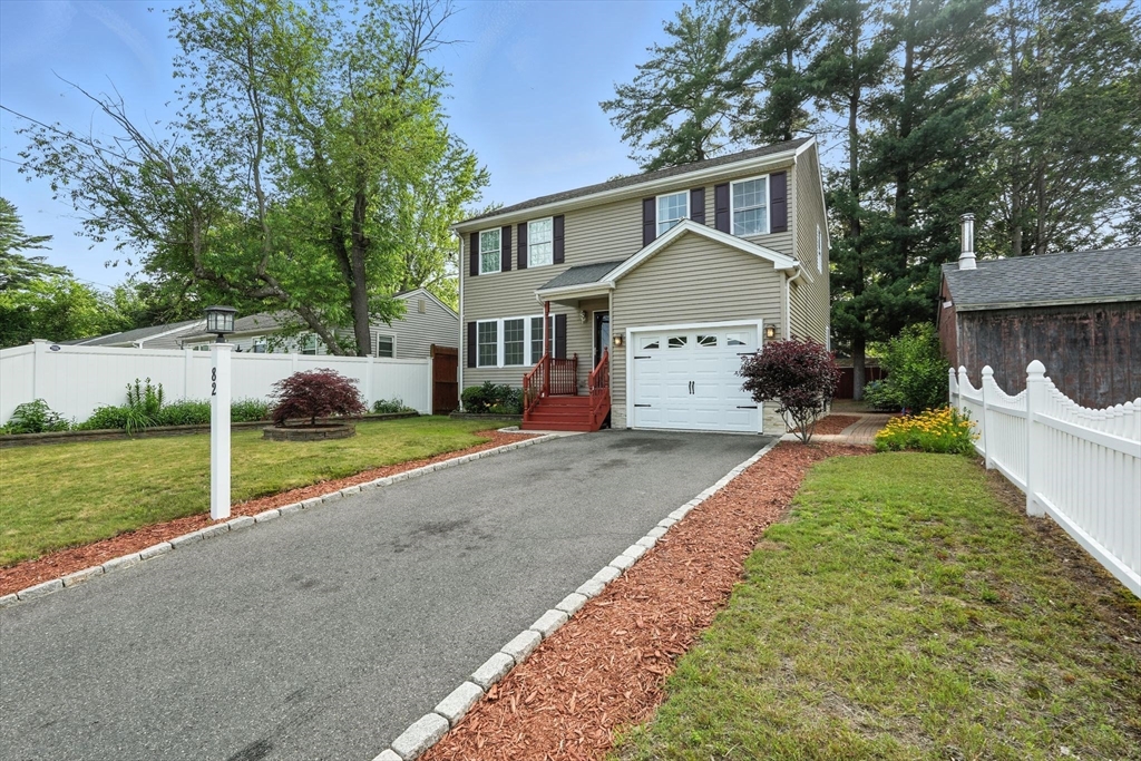 82 Lloyd Avenue Springfield, MA 01119 - Photo 3 of 32 a front view of house with yard and green space