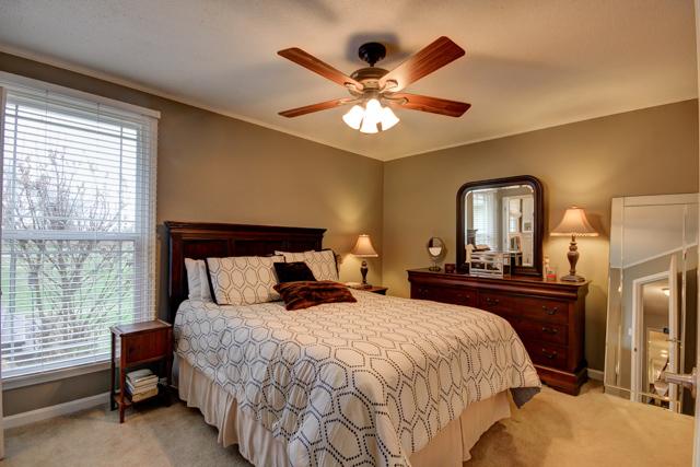 403 Sango Road Clarksville, TN 37043 - Photo 12 of 20 Master bedroom with custom paint colors and updated ceiling fan.