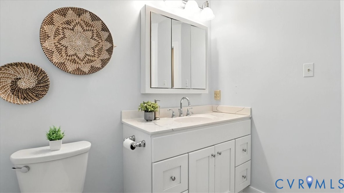 2701 Cassaway Road Midlothian, VA 23113 - Photo 25 of 47 a bathroom with a toilet and a sink