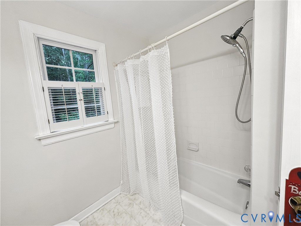 2701 Cassaway Road Midlothian, VA 23113 - Photo 31 of 47 a bathroom with a shower and a window