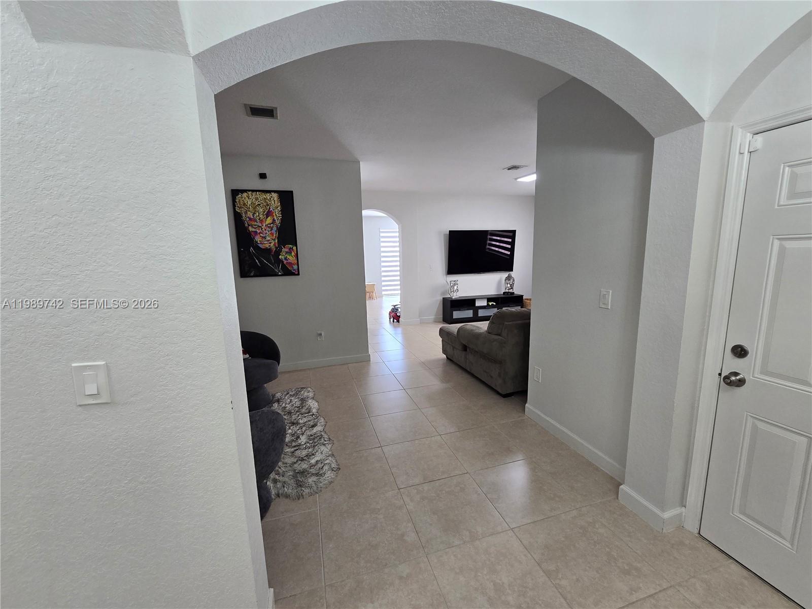 24164 Southwest 113th Path Homestead, FL 33032 - Photo 15 of 68 a view of a living room