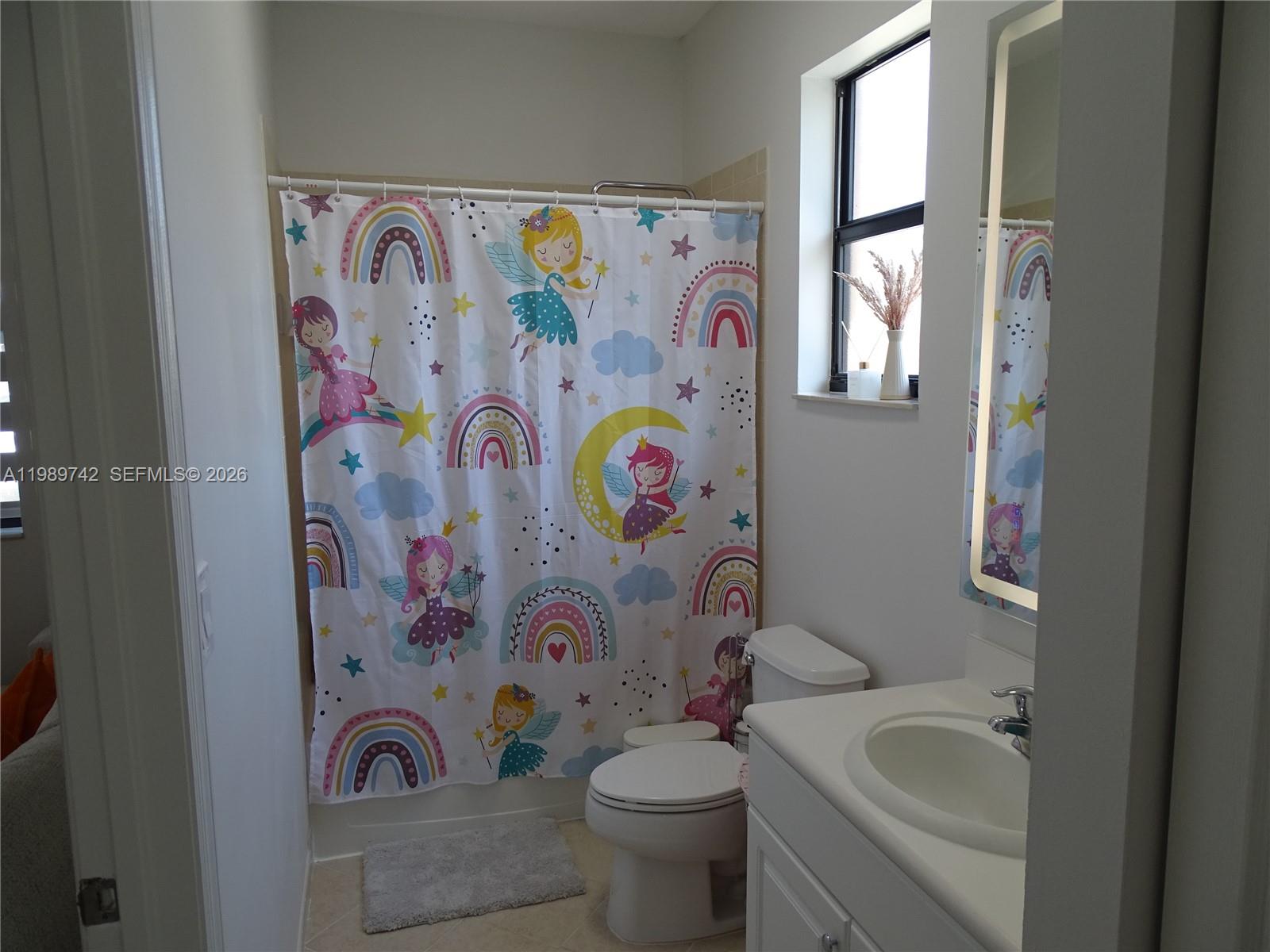 24164 Southwest 113th Path Homestead, FL 33032 - Photo 27 of 68 a bathroom with a sink and toilet