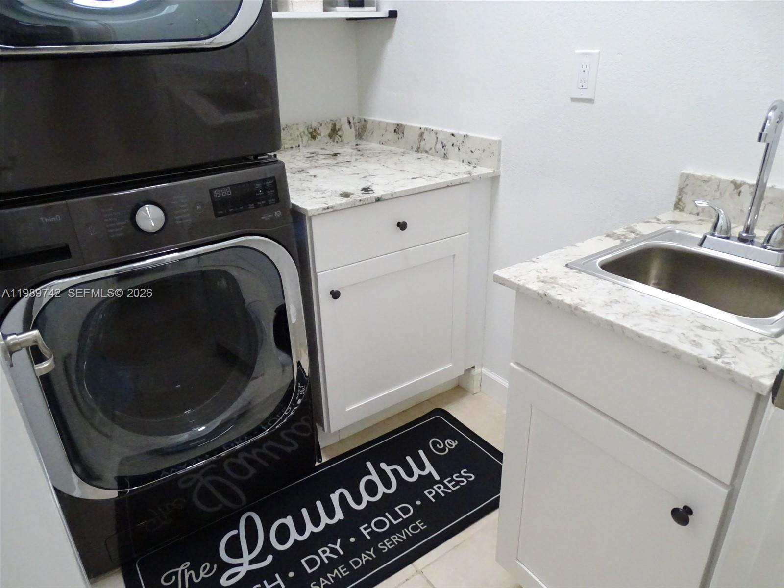 24164 Southwest 113th Path Homestead, FL 33032 - Photo 37 of 68 a utility room with dryer and washer