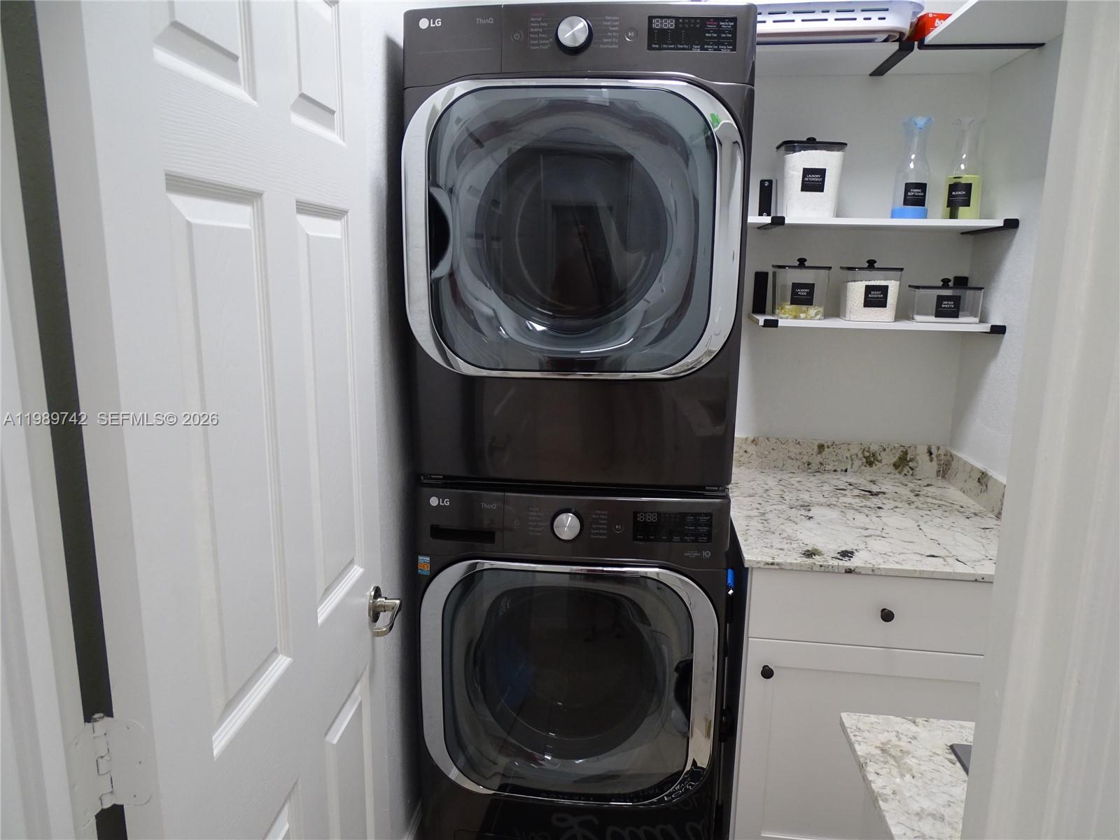 24164 Southwest 113th Path Homestead, FL 33032 - Photo 39 of 68 a utility room with dryer and washer