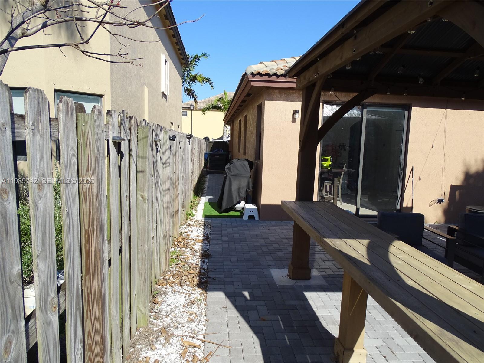 24164 Southwest 113th Path Homestead, FL 33032 - Photo 65 of 68 a view of outdoor space and porch