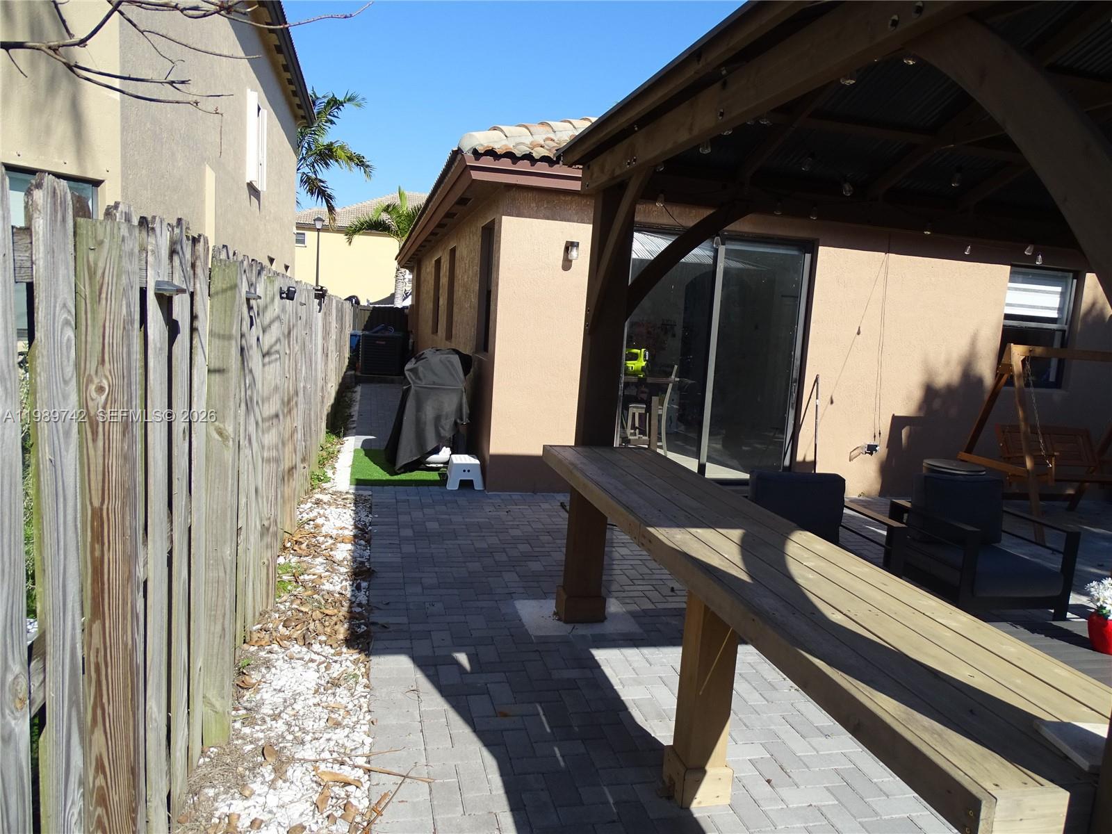 24164 Southwest 113th Path Homestead, FL 33032 - Photo 66 of 68 a view of entryway with wooden floor