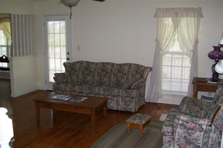 10748 Harrison Ferry Road McMinnville, TN 37110 - Photo 20 of 29 a living room with furniture and a window