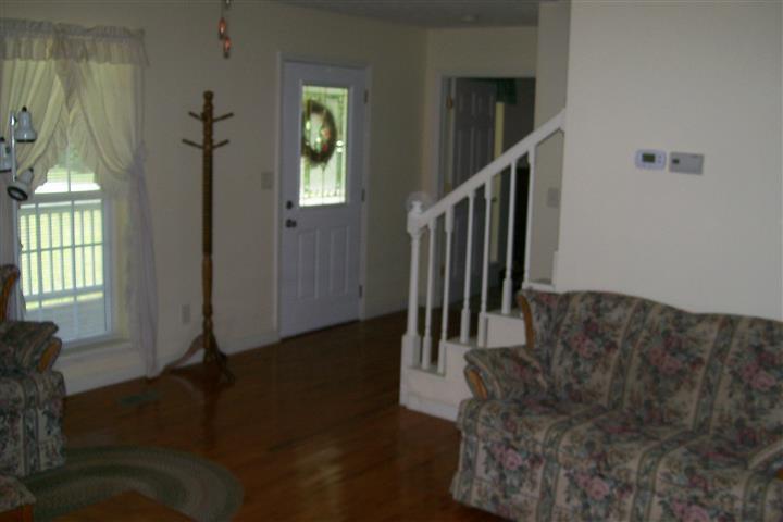 10748 Harrison Ferry Road McMinnville, TN 37110 - Photo 21 of 29 a view of entryway and hall with wooden floor