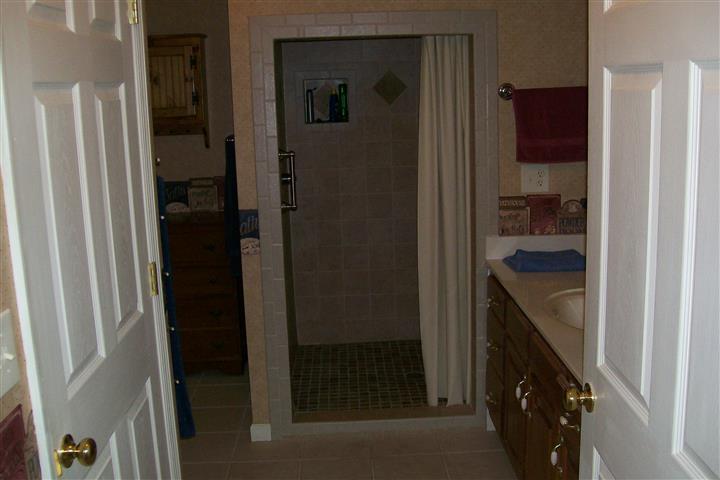10748 Harrison Ferry Road McMinnville, TN 37110 - Photo 23 of 29 a bathroom with a shower