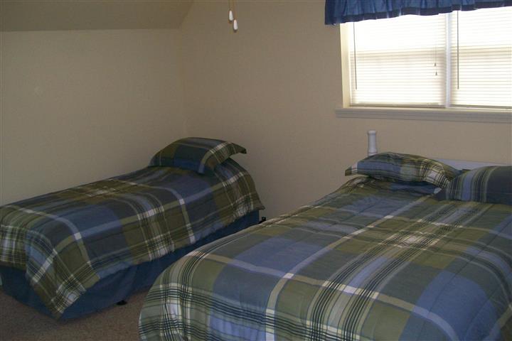10748 Harrison Ferry Road McMinnville, TN 37110 - Photo 26 of 29 a bedroom with a bed and window