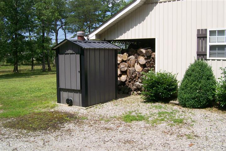 10748 Harrison Ferry Road McMinnville, TN 37110 - Photo 8 of 29 a front view of a house with garden