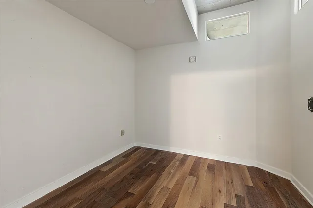 a view of small space with wooden floor