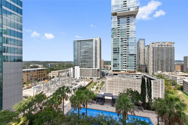 a view of a city with tall buildings