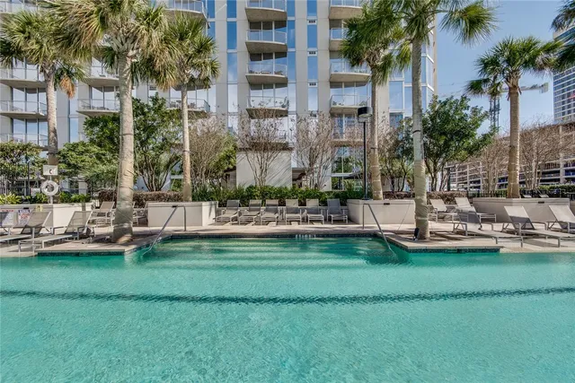 a view of a tall building from a patio