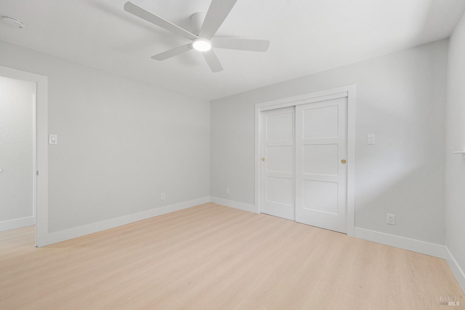 2129 Rockville Road Fairfield, CA 94534 - Photo 33 of 59 an empty room with a ceiling fan and a window