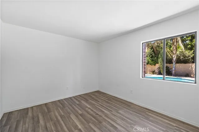 a bathroom with a sink toilet vanity and shower