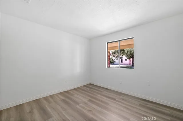 a view of a backyard of the house