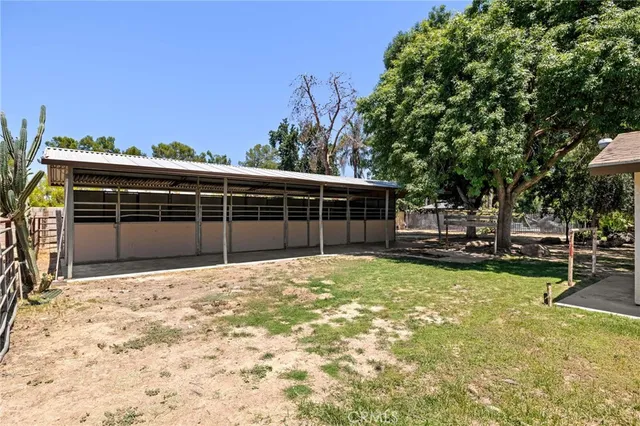 a view of outdoor space with deck and tree