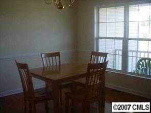 173 Maple Ridge Circle Salisbury, NC 28147 - Photo 4 of 8 a dining room with furniture and window