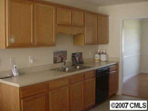 173 Maple Ridge Circle Salisbury, NC 28147 - Photo 5 of 8 a kitchen with a sink cabinets and appliances