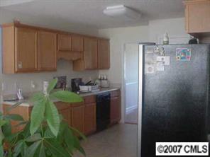 173 Maple Ridge Circle Salisbury, NC 28147 - Photo 6 of 8 a kitchen with a sink and cabinets