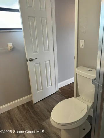 a bathroom with a toilet
