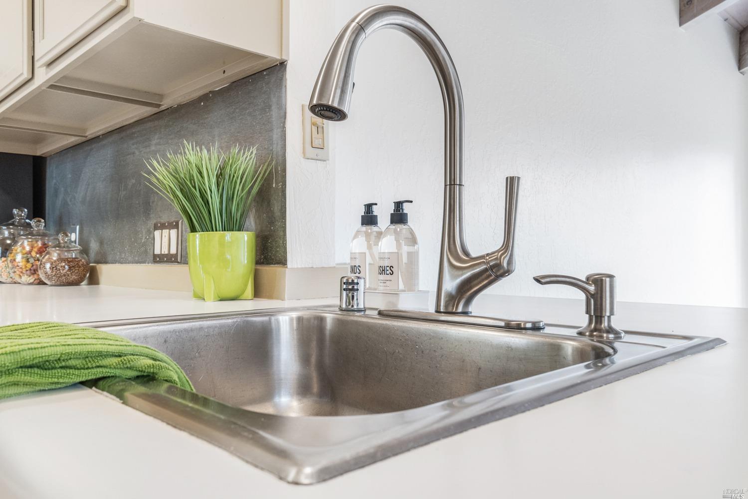 229 Stonecrest Drive Napa, CA 94558 - Photo 13 of 41 a close view of sink and tap