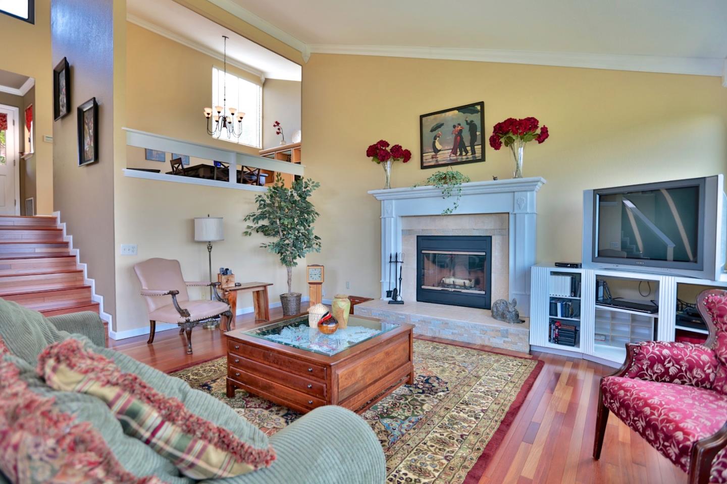 9040 El Matador Drive Gilroy, CA 95020 - Photo 11 of 26 a living room with furniture and a fireplace