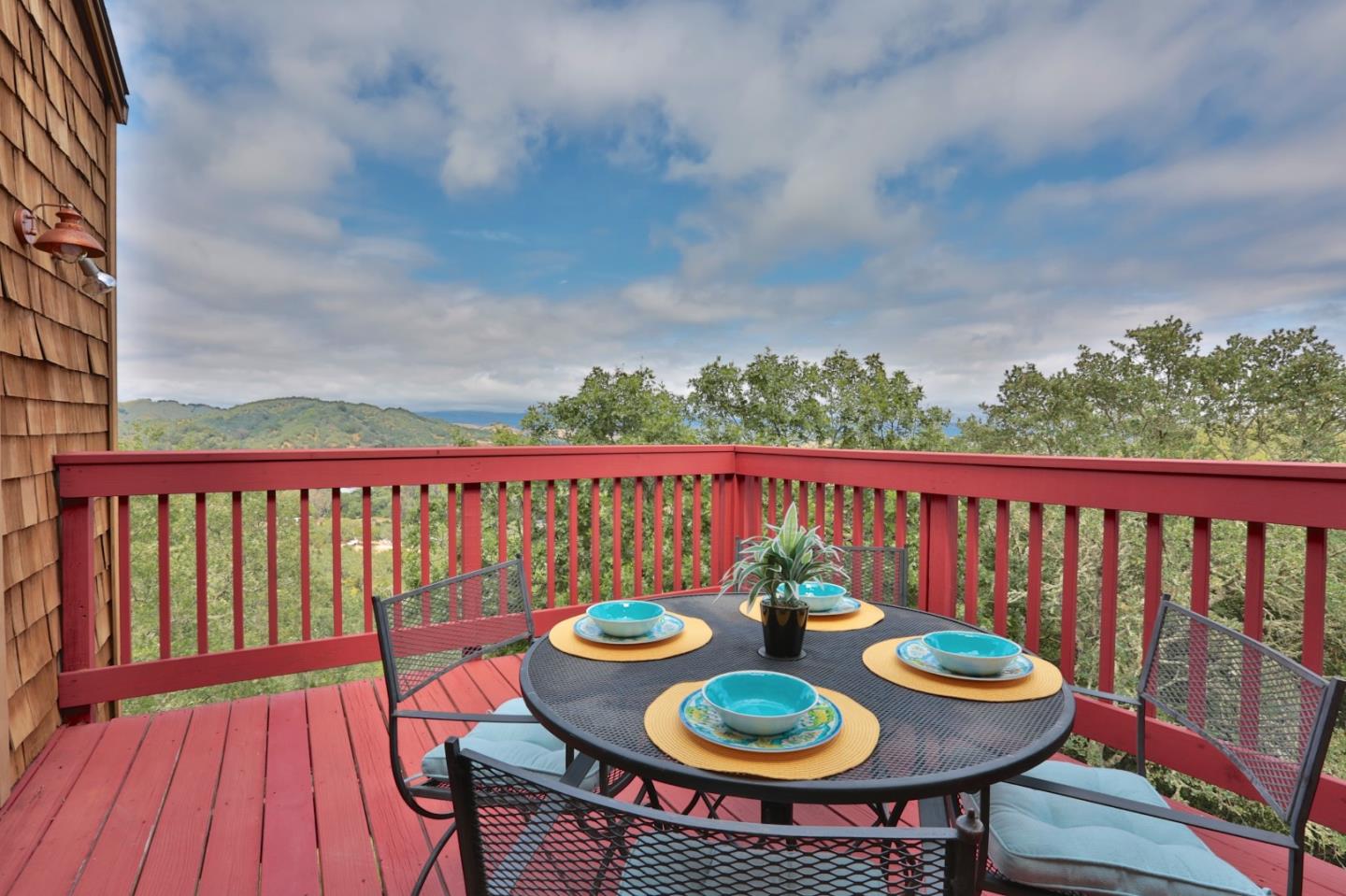 9040 El Matador Drive Gilroy, CA 95020 - Photo 12 of 26 a view of a chairs and table on the roof deck