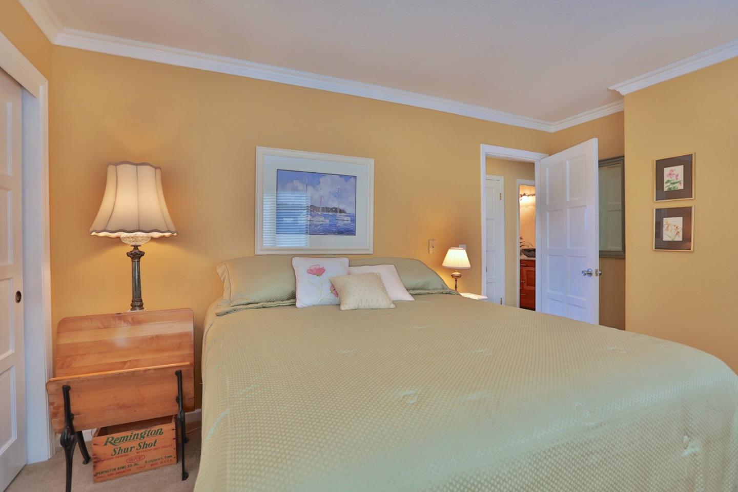 9040 El Matador Drive Gilroy, CA 95020 - Photo 17 of 26 a bedroom with a bed and a lamp on table