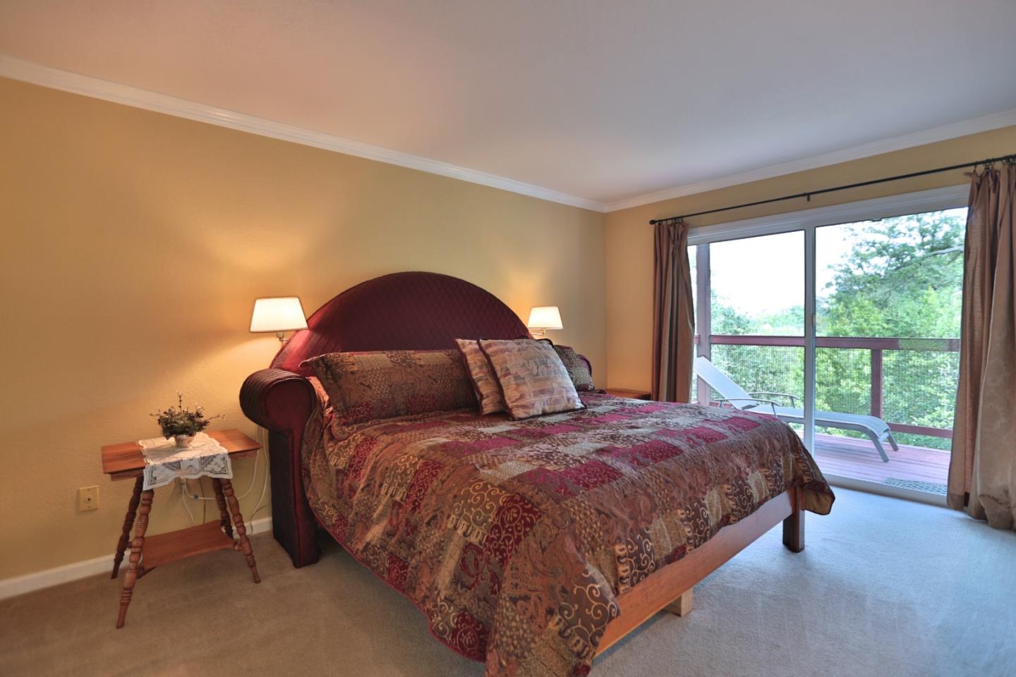 9040 El Matador Drive Gilroy, CA 95020 - Photo 19 of 26 a bedroom with a bed and a window