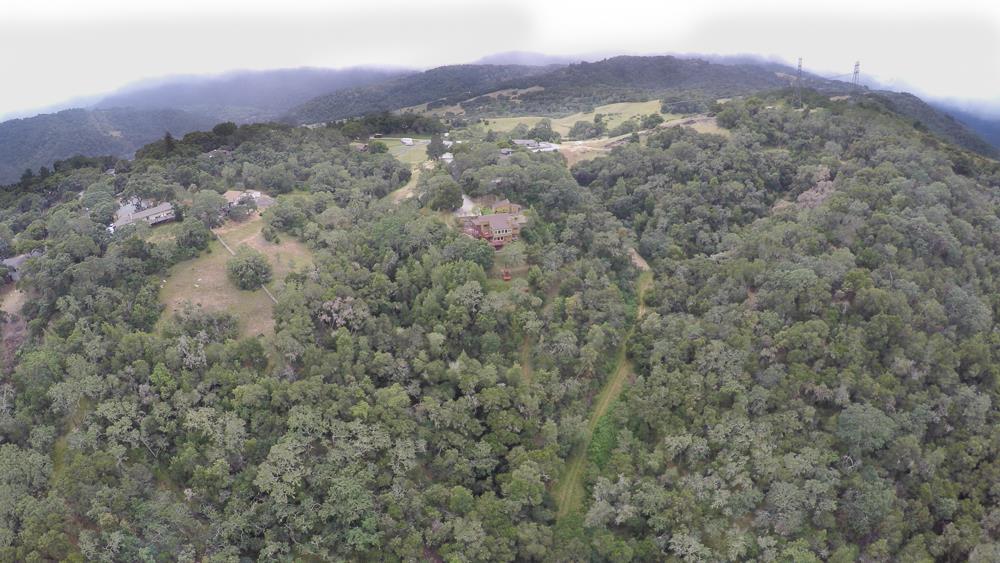 9040 El Matador Drive Gilroy, CA 95020 - Photo 26 of 26 a view of a dry yard with mountains in the background