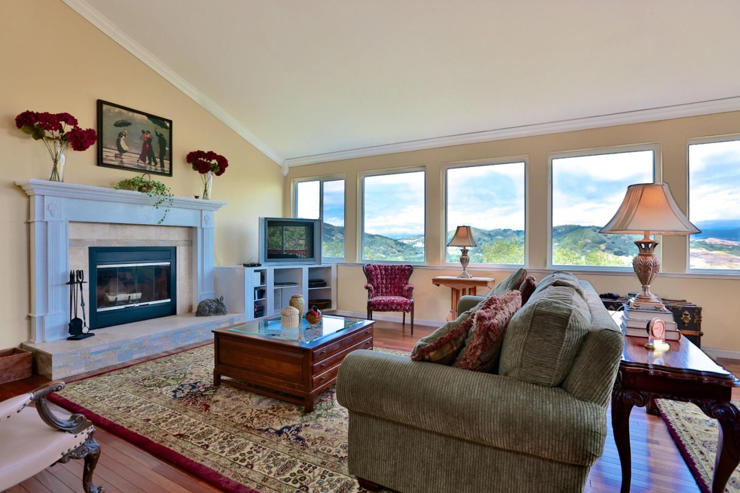 9040 El Matador Drive Gilroy, CA 95020 - Photo 9 of 26 a living room with furniture and a fireplace