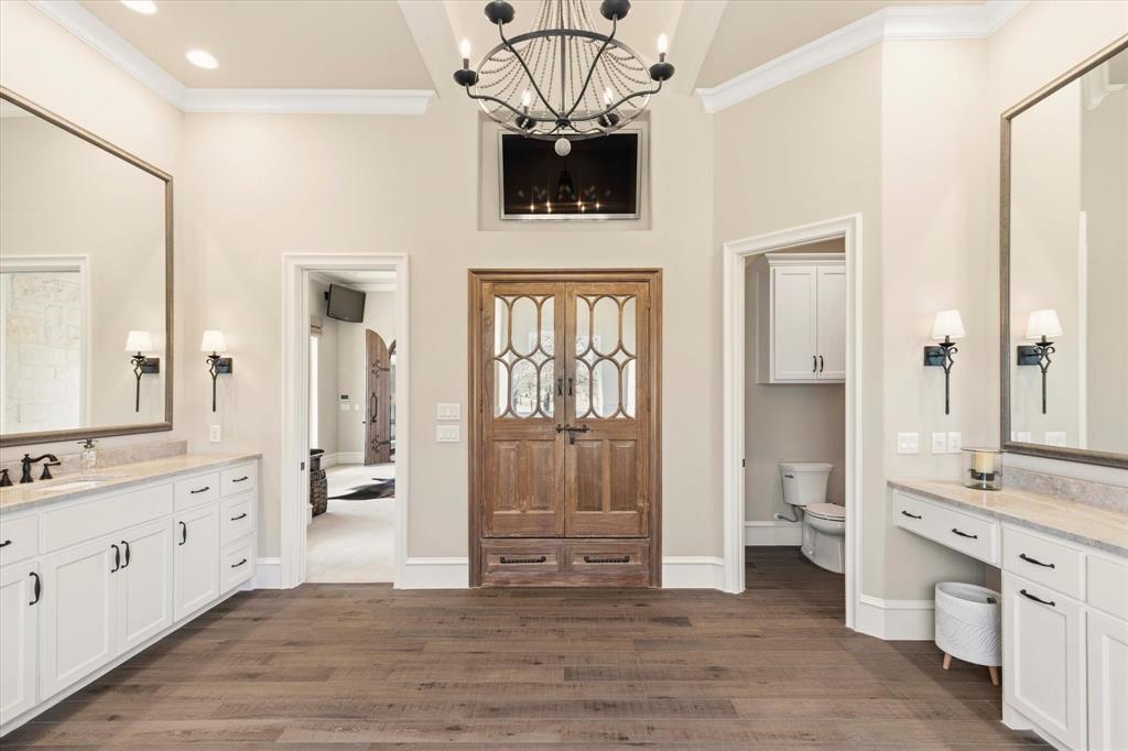 8301 Stephens Ranch Road Pilot Point, TX 76258 - Photo 21 of 40 More custom design doors in the primary en-suite