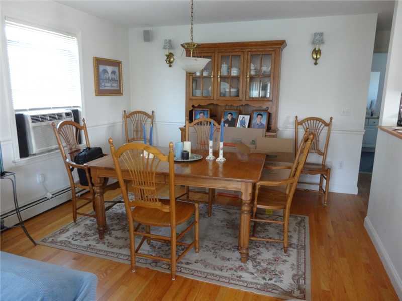 16 Abalone Road Narragansett, RI 02882 - Photo 16 of 18 Dining Room. open floor plan from kitchen to dining . nice hardwoods, plenty of space