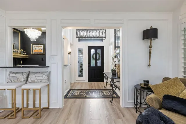 a view of a livingroom with furniture and windows