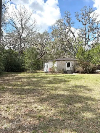a view of house with outdoor space