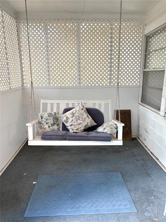 21249 Durden Road Dade City, FL 33523 - Photo 11 of 28 a living room with furniture and a flat screen tv