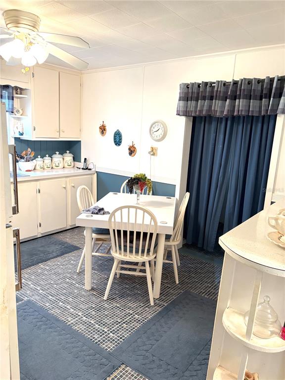 21249 Durden Road Dade City, FL 33523 - Photo 3 of 28 a dining room with furniture and wooden floor