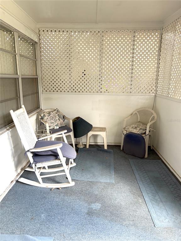 21249 Durden Road Dade City, FL 33523 - Photo 10 of 28 a living room with furniture and a window