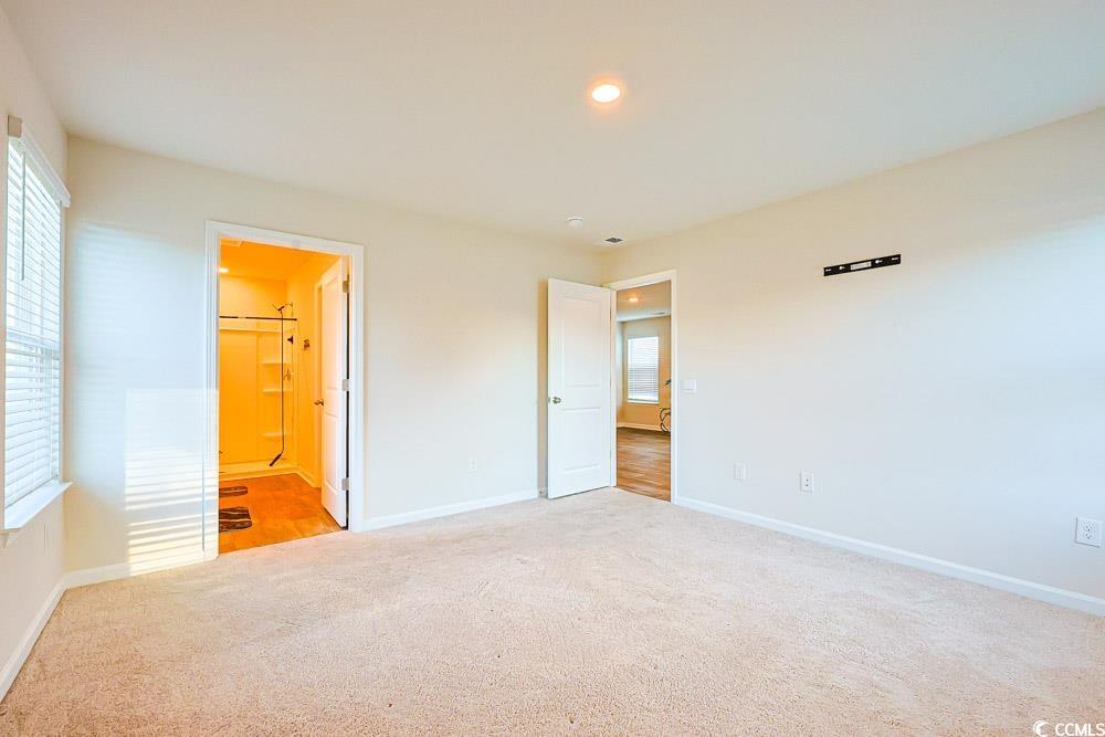 224 Jeff Waters Circle Longs, SC 29568 - Photo 13 of 30 Unfurnished bedroom with light carpet, recessed lighting, and ensuite bathroom