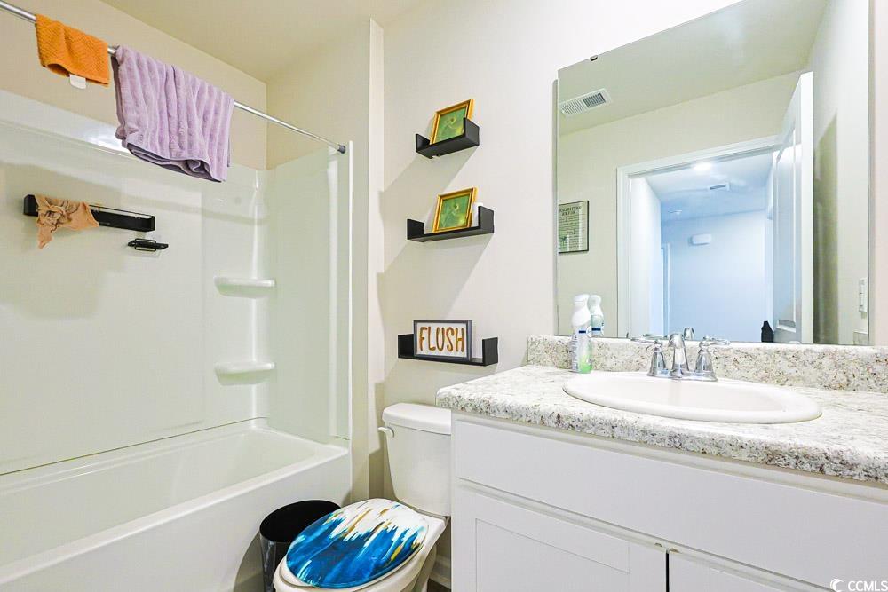 224 Jeff Waters Circle Longs, SC 29568 - Photo 18 of 30 Full bath with vanity and shower / tub combination