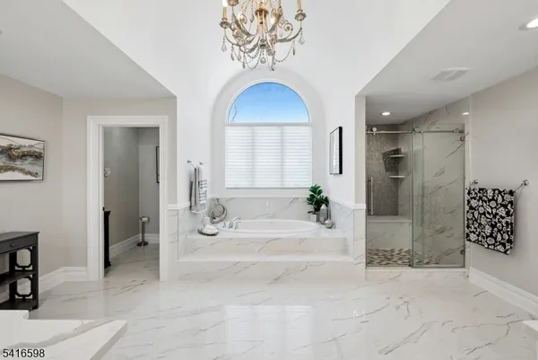 a view of house with outdoor space and swimming pool