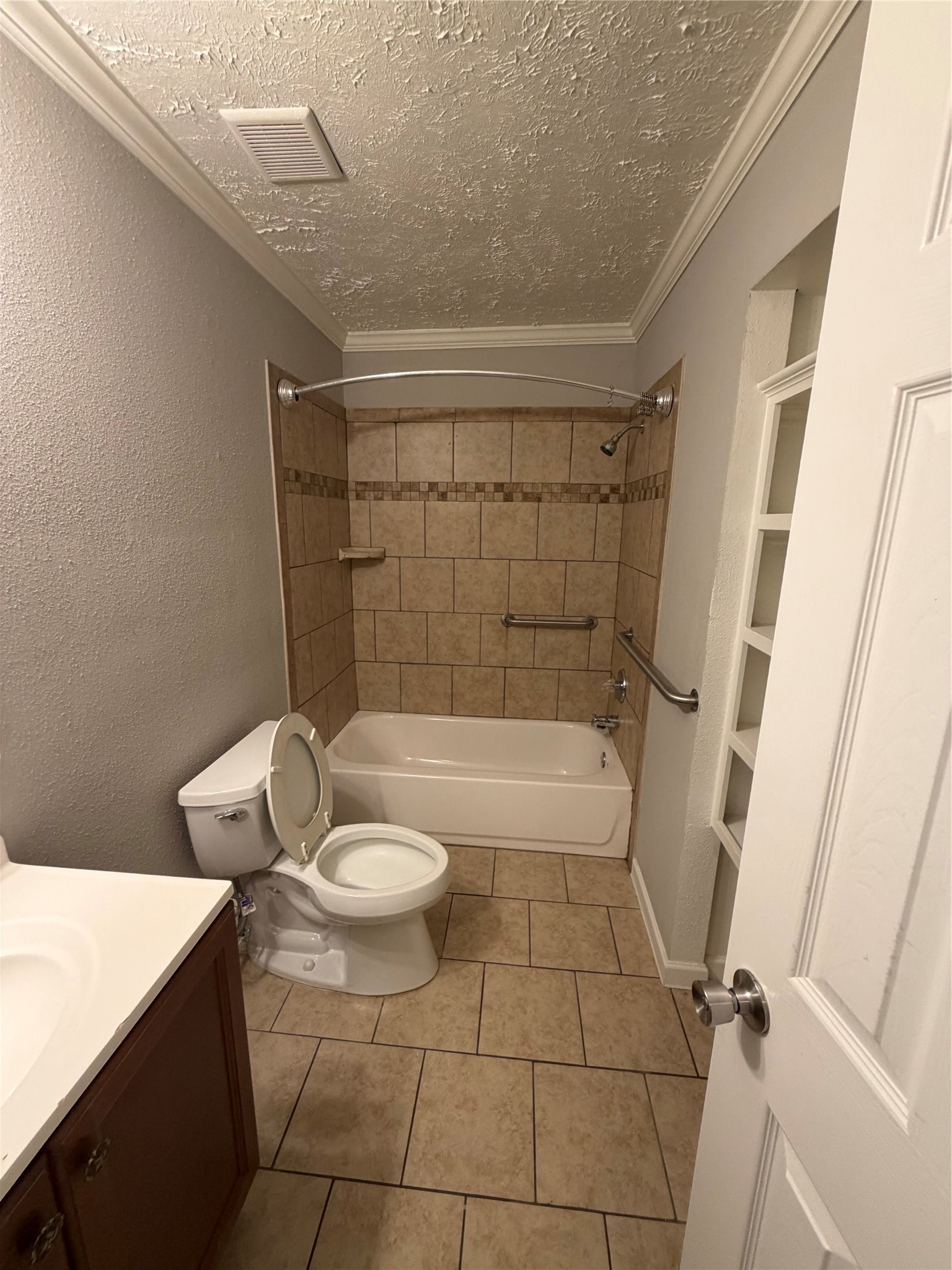 8662 Pearl Point Street Houston, TX 77044 - Photo 15 of 28 a bathroom with a sink a toilet and shower