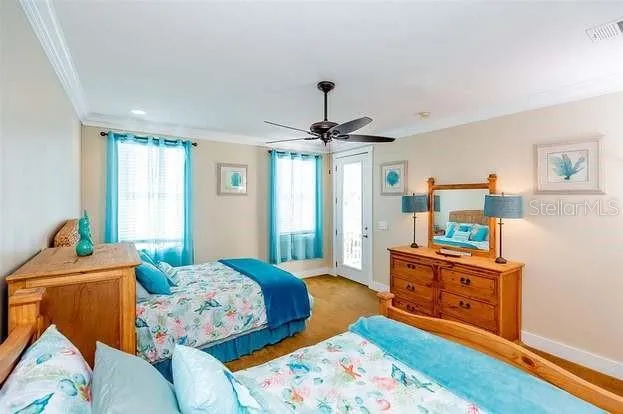 a bedroom with furniture and a window