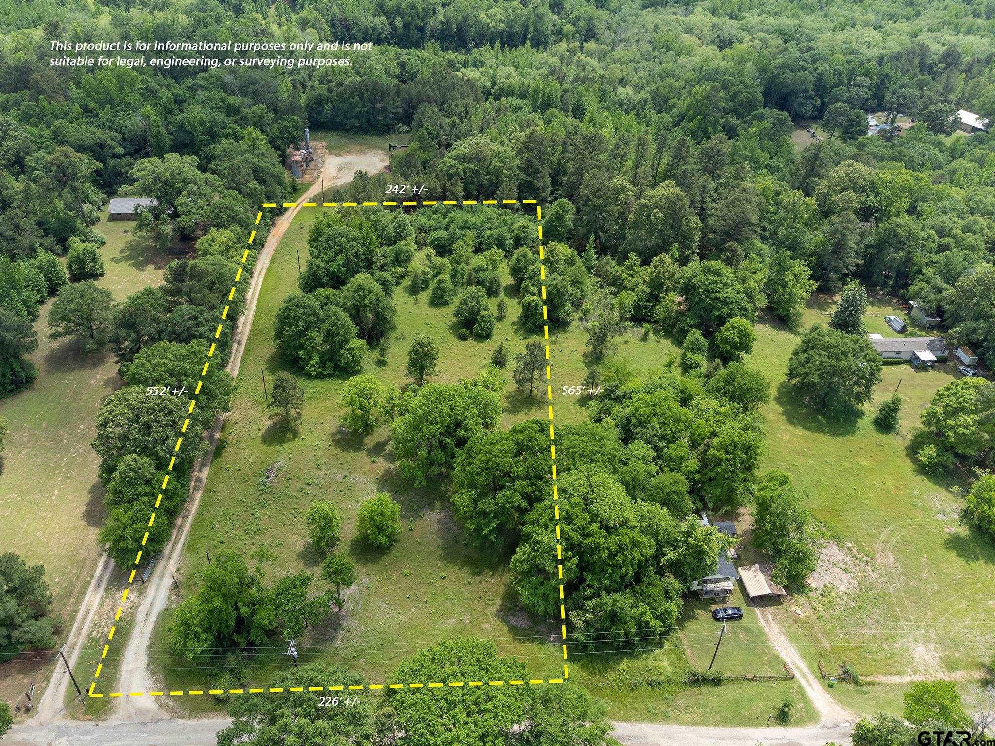 2255 Tyler Tx 75708 Tyler, TX 75708 - Photo 2 of 16 an aerial view of residential house with outdoor space and trees all around